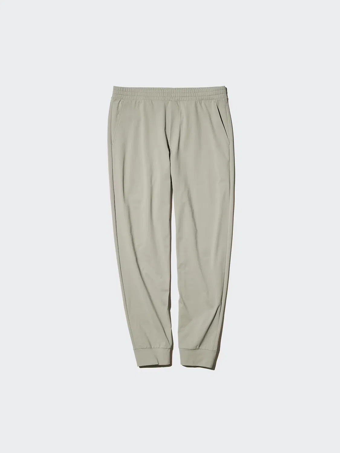 картинка Эластичные спортивные брюки-джоггеры Uniqlo, удлиненный крой, синий от магазина Одежда+