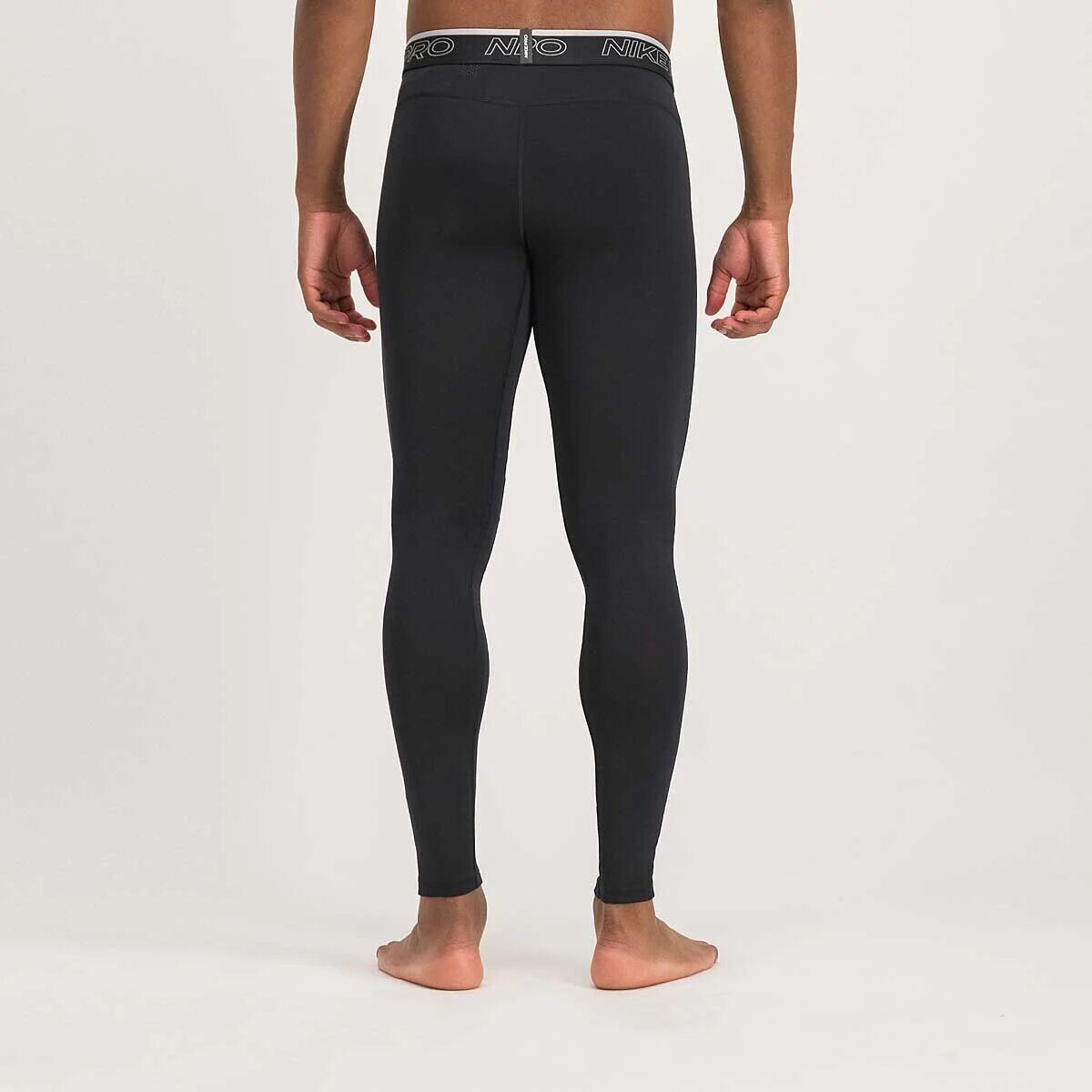 картинка Тайтсы NP Dri-Fit Nike, черно-белый от магазина Одежда+