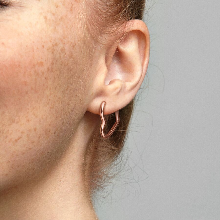 картинка Серьги Pandora Asymmetrical Heart, розовое золото от магазина Одежда+