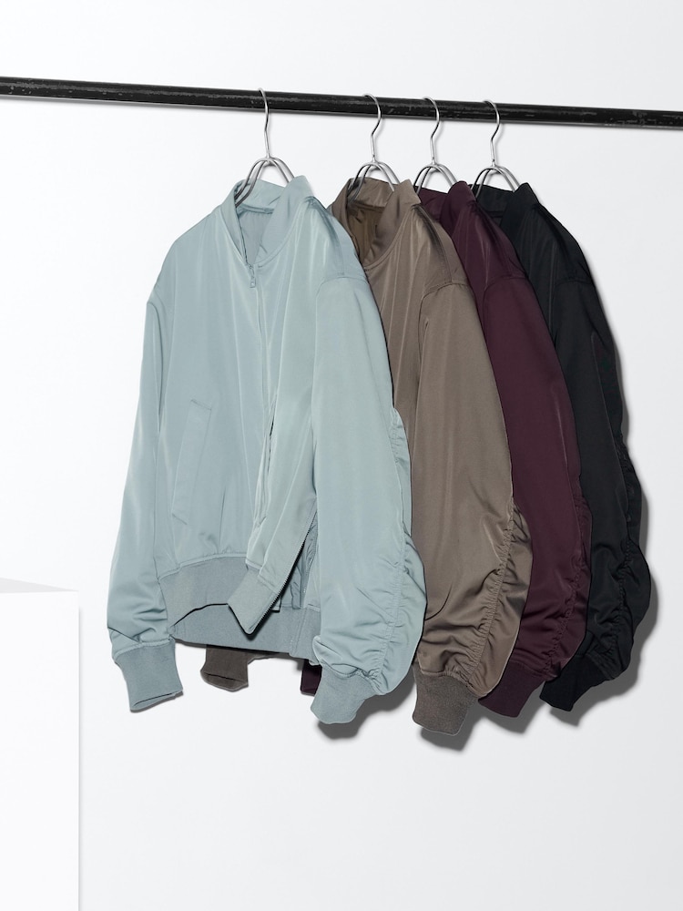 картинка Женская куртка-бомбер Uniqlo, черная от магазина Одежда+