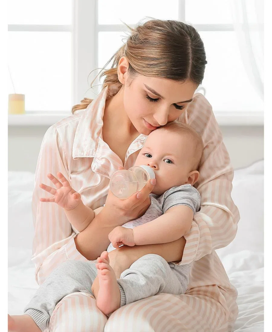 картинка Подогреватель детских бутылочек Momcozy, белый от магазина Одежда+