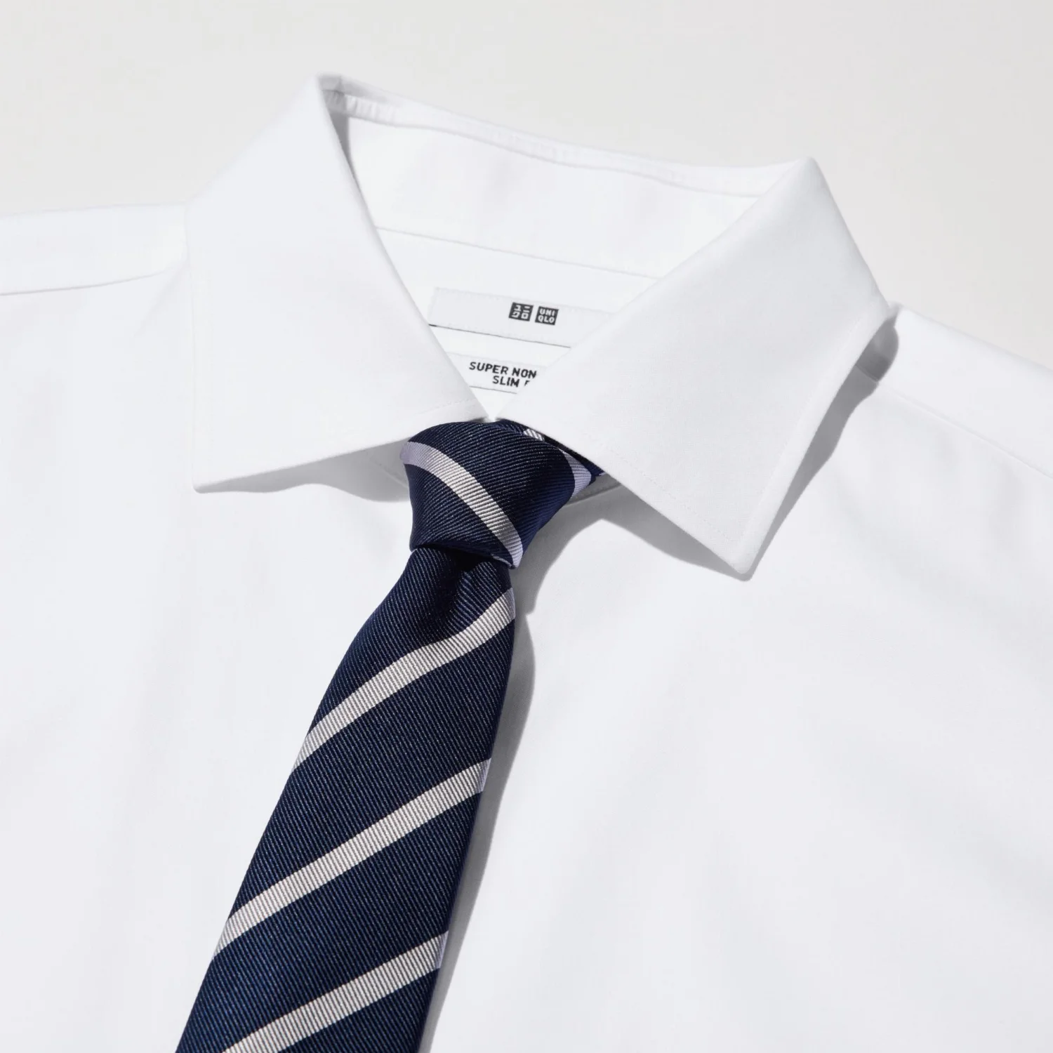 картинка Рубашка Uniqlo Super Non-Iron Slim, 00 белый от магазина Одежда+