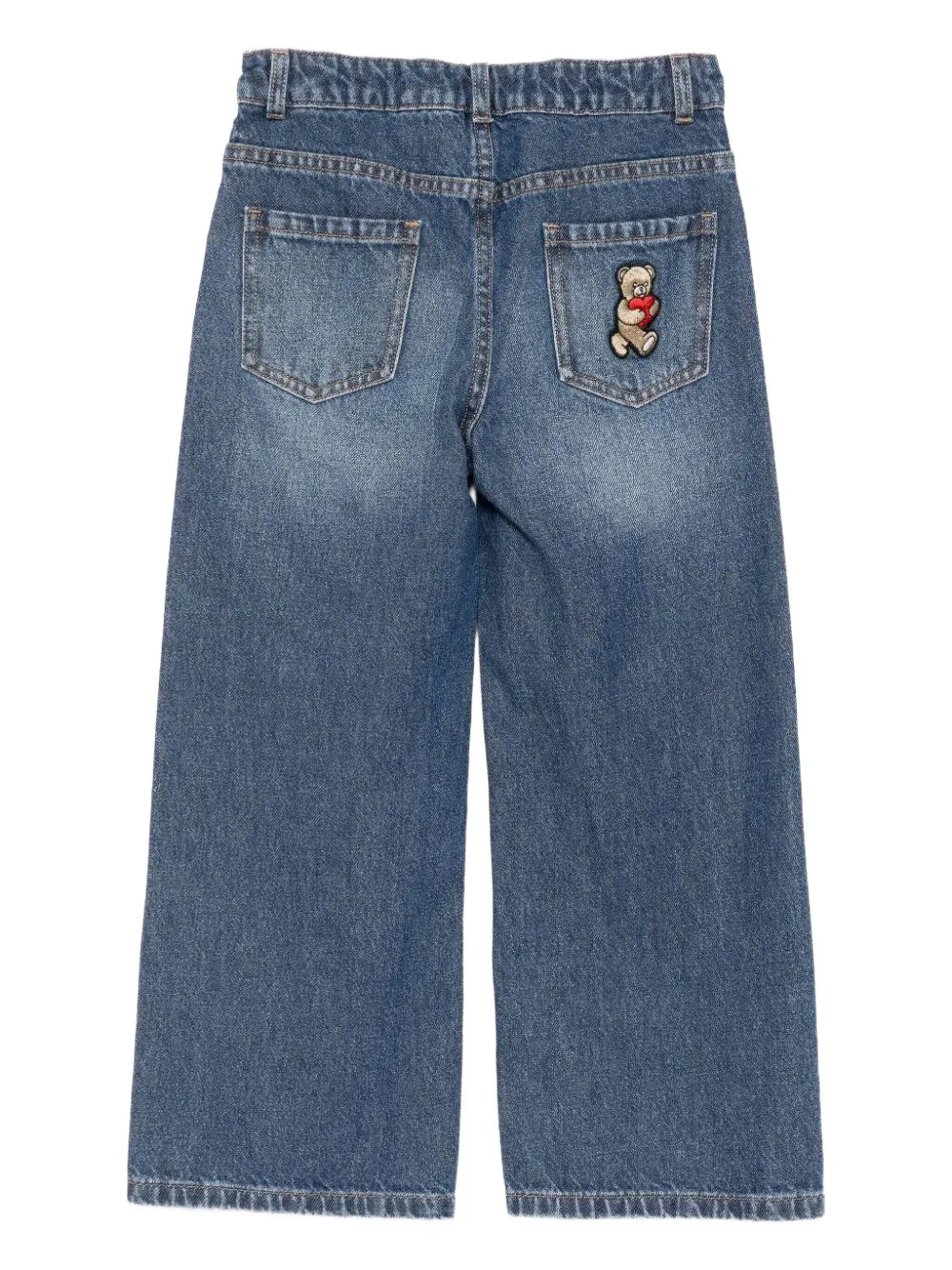 картинка Брюки с аппликацией в виде мишки Moschino Kids, синий от магазина Одежда+