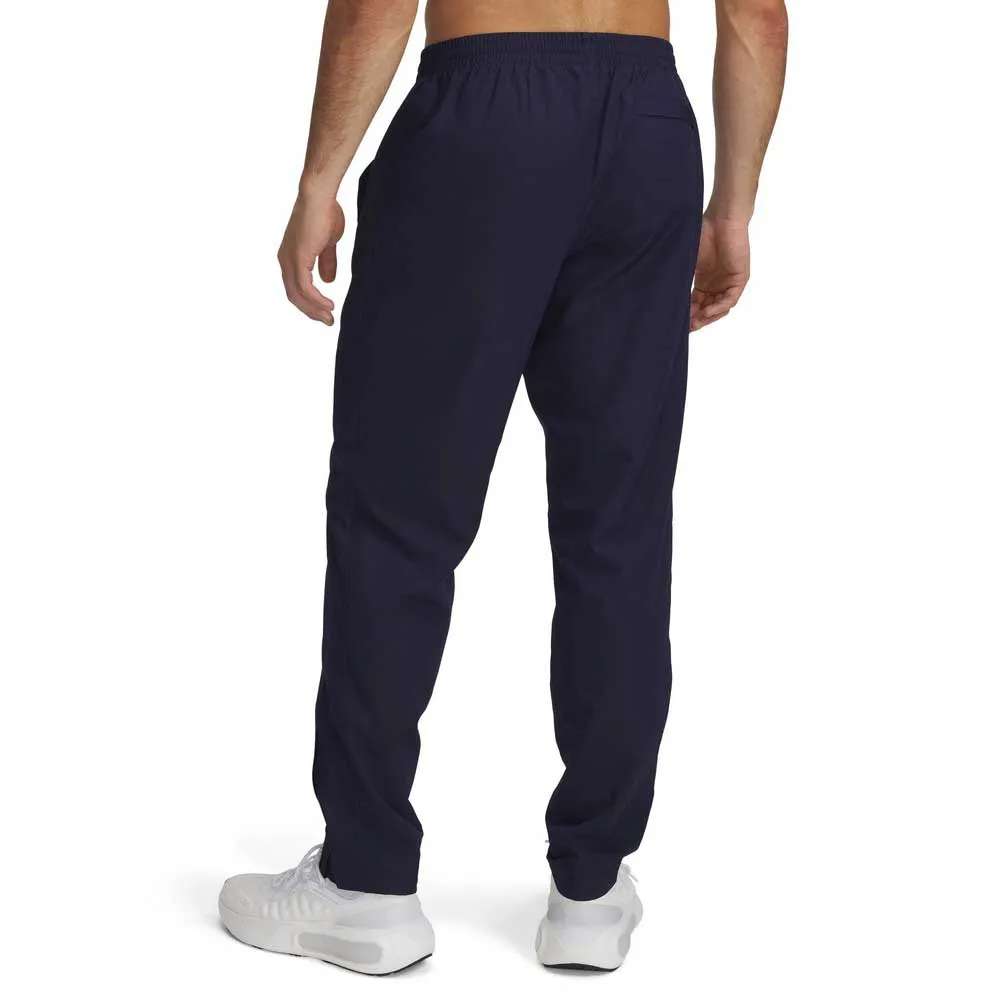 картинка Брюки Under Armour Rival Woven Windbreaker, синий от магазина Одежда+