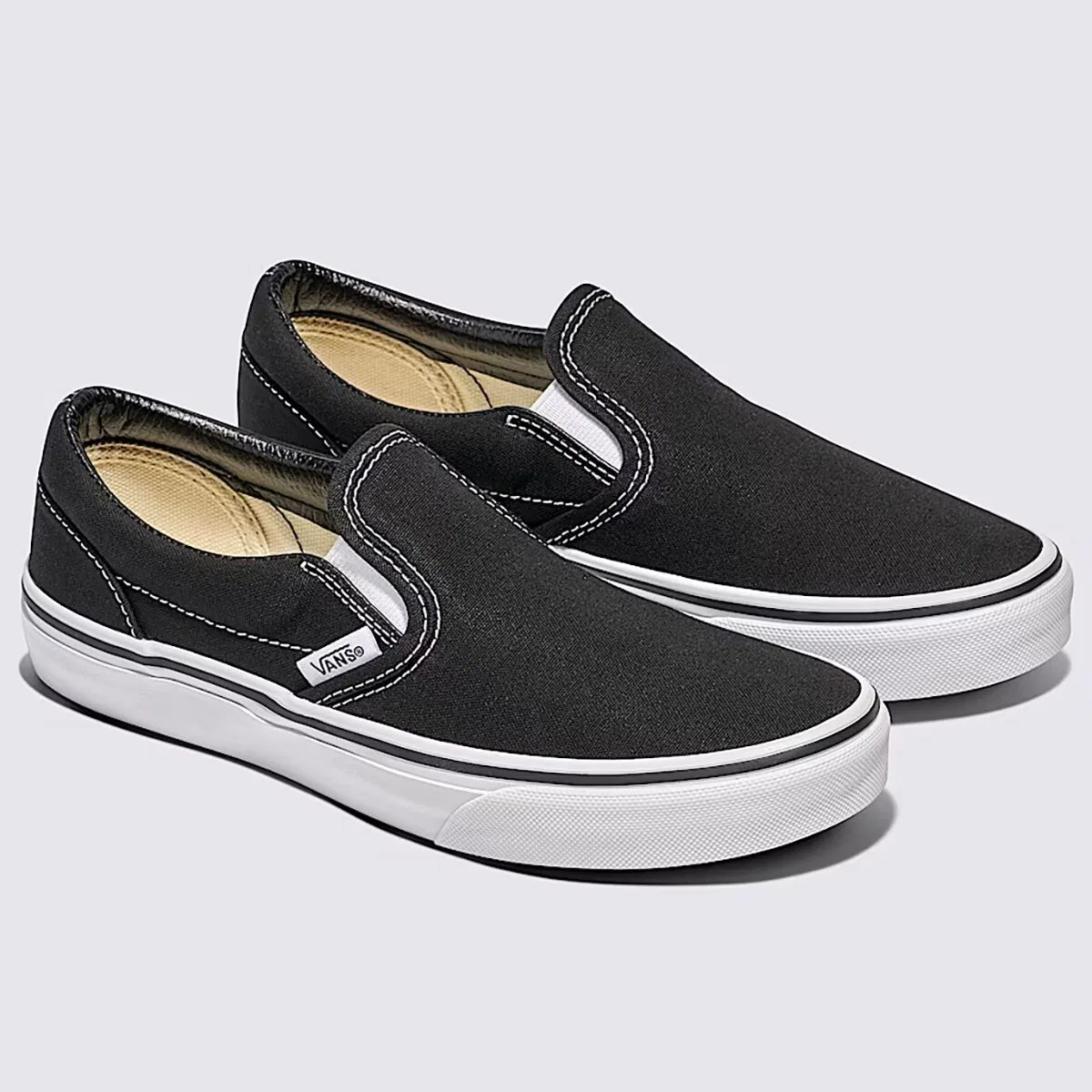 картинка Детские кеды-слипоны с принтом Vans, черный от магазина Одежда+